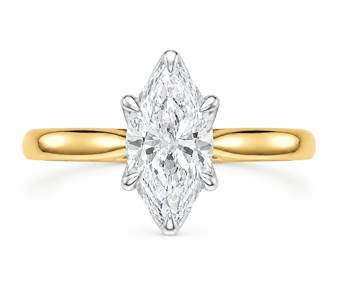 Leighton 14K yellow gold engagement ring with a marquise diamond in white gold claw prongs.