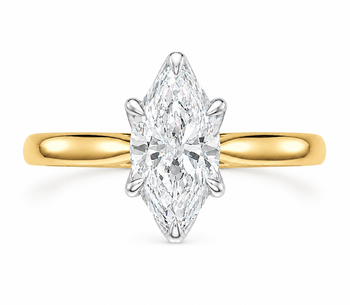 Leighton 14K yellow gold engagement ring with a marquise diamond in white gold claw prongs.