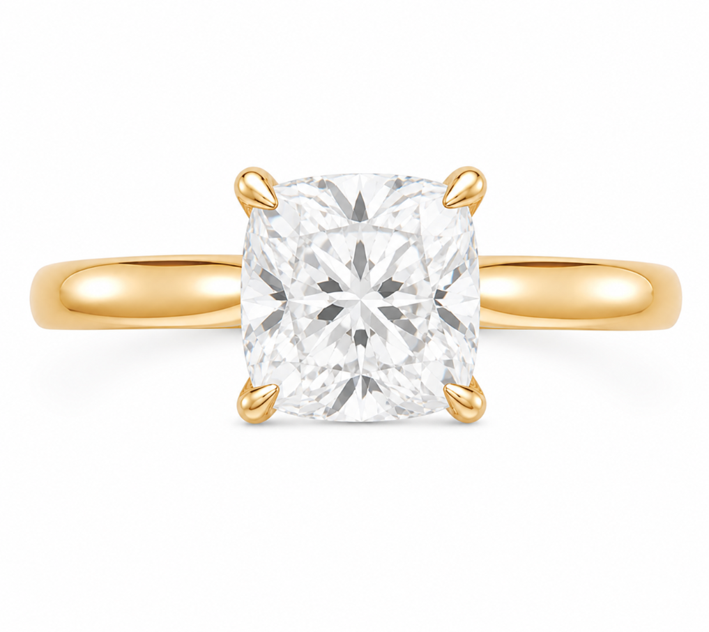 Leighton modern solitaire engagement ring with a 2 CT cushion diamond and 14K yellow gold band.