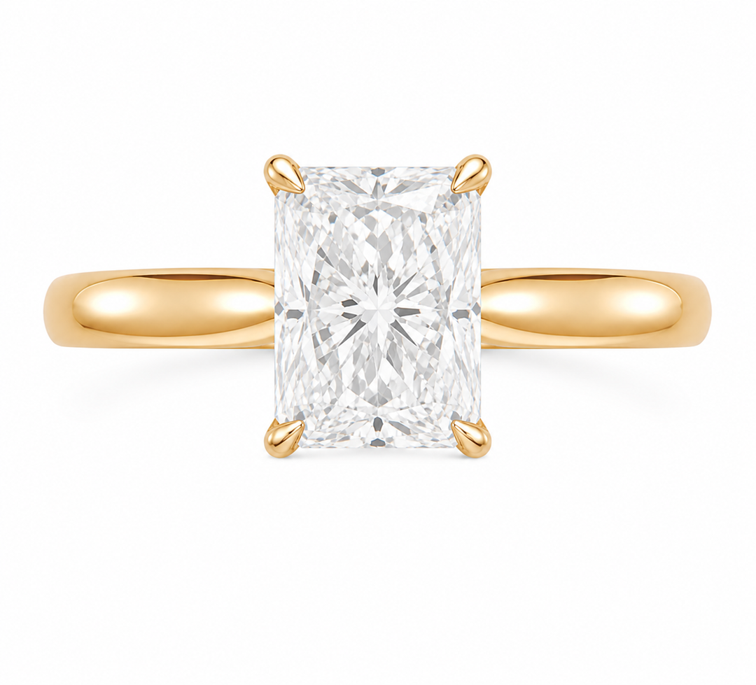 Leighton modern solitaire engagement ring with a 2 CT radiant diamond in 14K yellow gold.