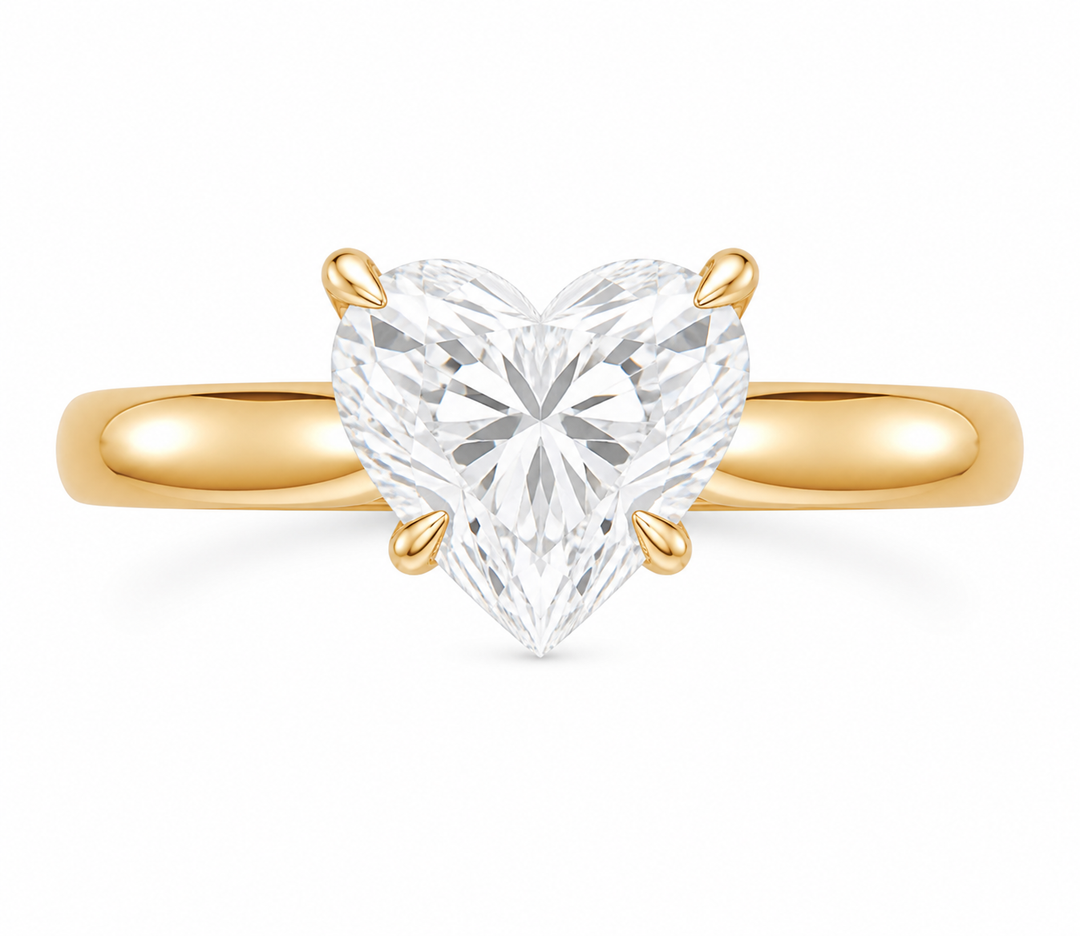 Leighton 14K yellow gold engagement ring with a heart-shaped diamond in claw prongs.