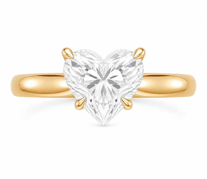 Leighton 14K yellow gold engagement ring with a heart-shaped diamond in claw prongs.