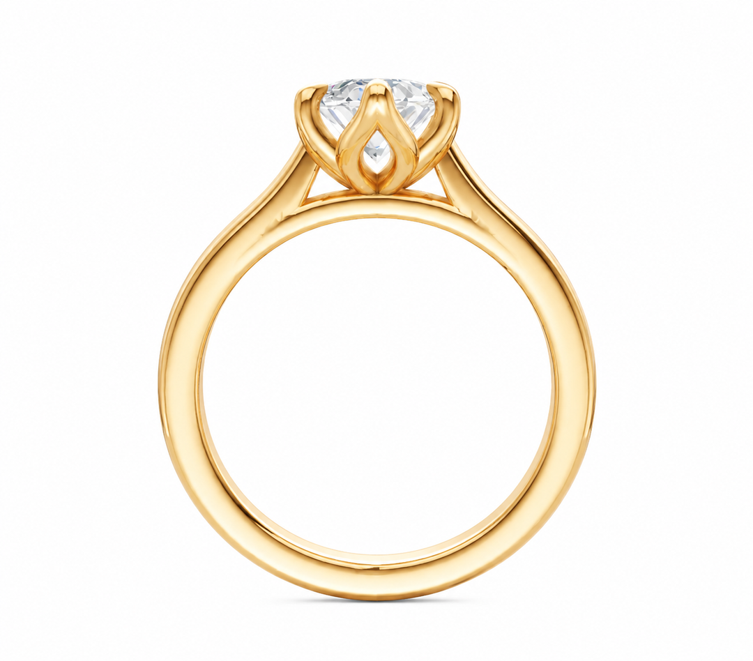 Leighton modern solitaire engagement ring in 14K gold with a 2 CT diamond and petal claw prongs.