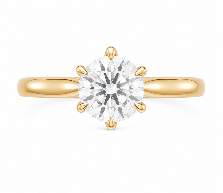 Leighton modern solitaire engagement ring in 14K gold with a 2 CT round diamond and claw prongs.