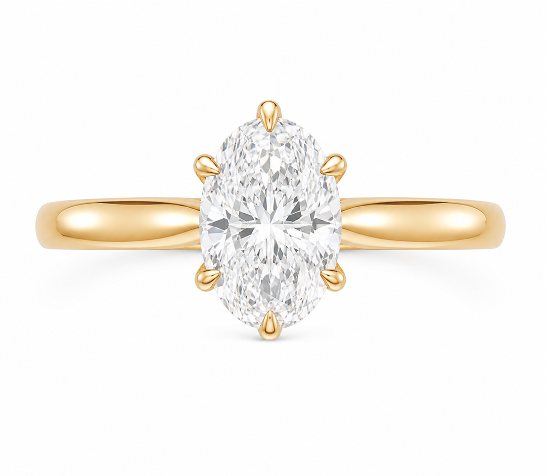 Leighton Signature 14K gold engagement ring with a 2 CT oval diamond and claw prongs.