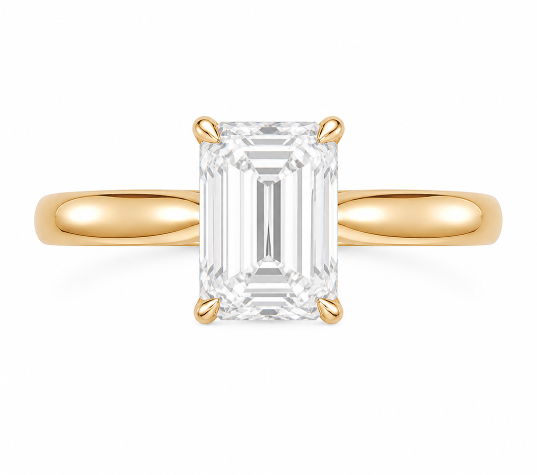 14K yellow gold Leighton engagement ring with a 2 CT emerald cut diamond solitaire.