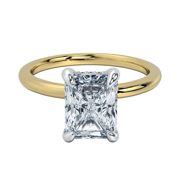 Margot classic solitaire engagement ring with a radiant cut diamond, yellow gold band, and white gold prongs.