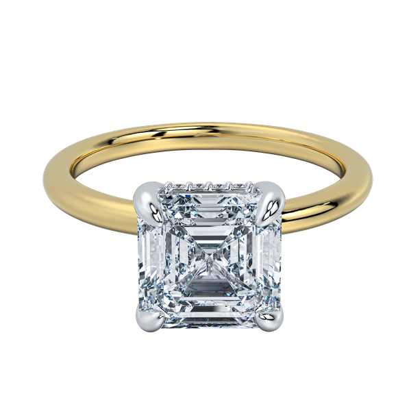 Margot solitaire engagement ring with a radiant cut diamond, yellow gold band, and white gold prongs.