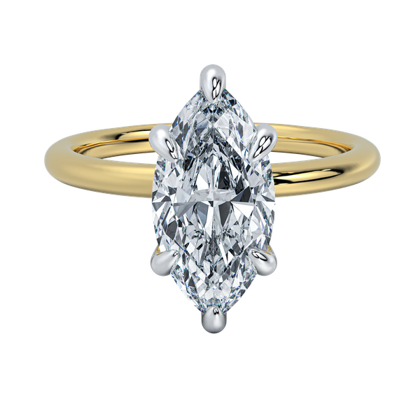 Margot engagement ring with a marquise diamond, yellow gold band, and platinum prongs.