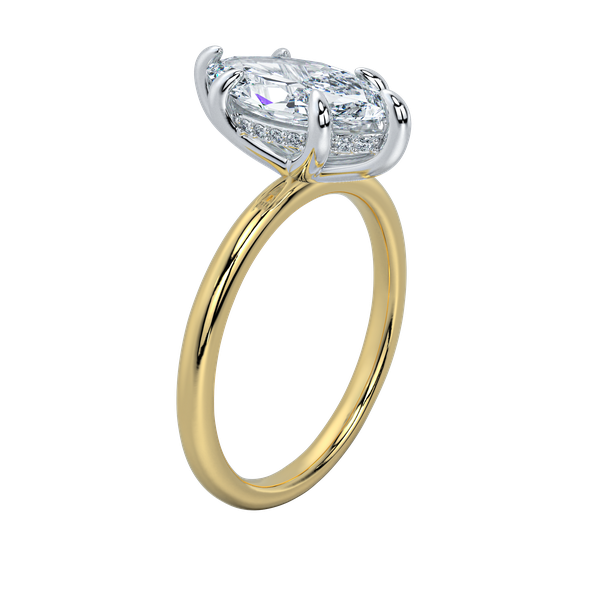 Margot solitaire engagement ring with a yellow gold band, white gold prongs, and a hidden halo.