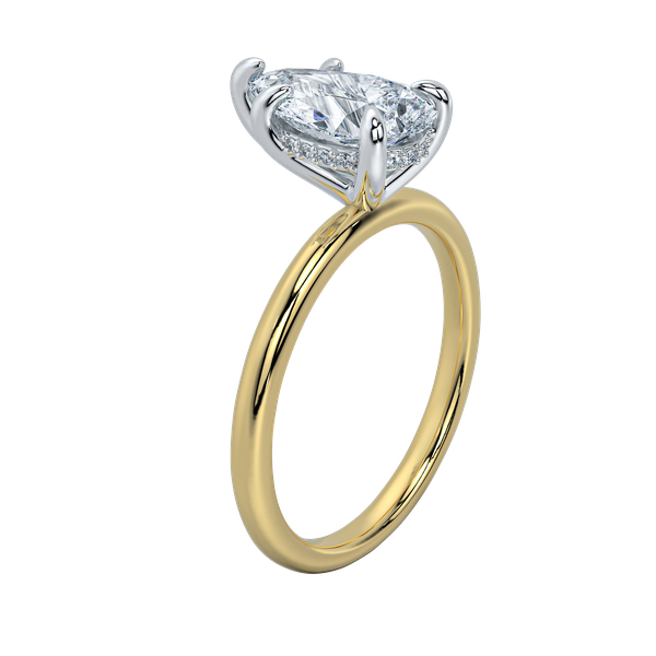 Margot solitaire engagement ring with a pear-shaped diamond, yellow gold band, and petite hidden halo.
