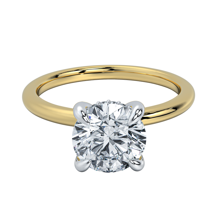 Margot classic solitaire engagement ring with a round diamond, yellow gold band, and petite hidden halo.