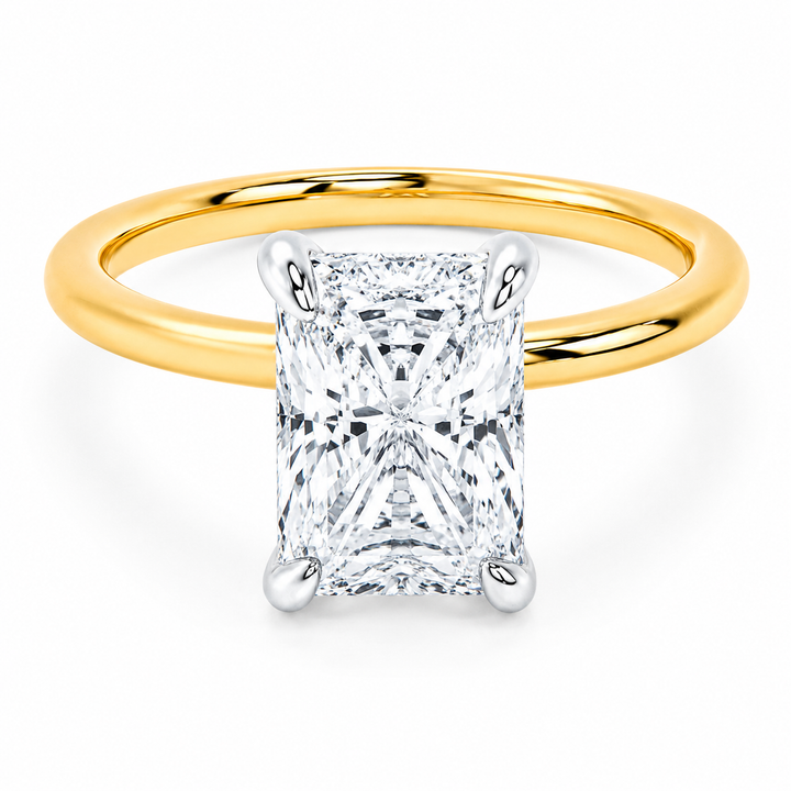 Margot Signature Engagement Style ring with a radiant cut diamond, 14K yellow gold band, and white gold prongs.