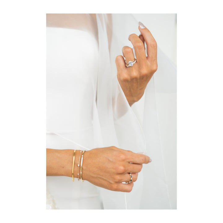 Margot 14K yellow and white gold solitaire engagement ring with a hidden halo and 2 CT diamond.