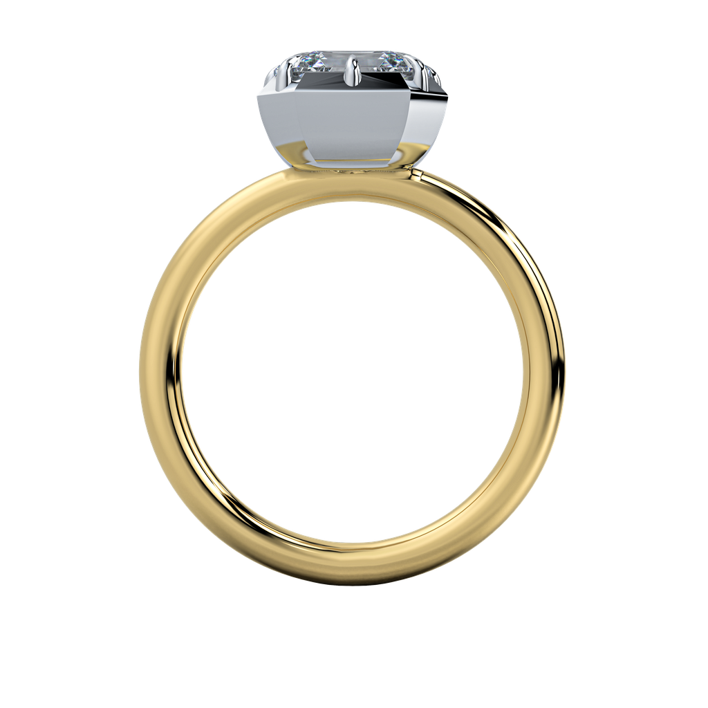 Taylor engagement ring: gold band with a sleek emerald-cut diamond in a clean bezel setting.