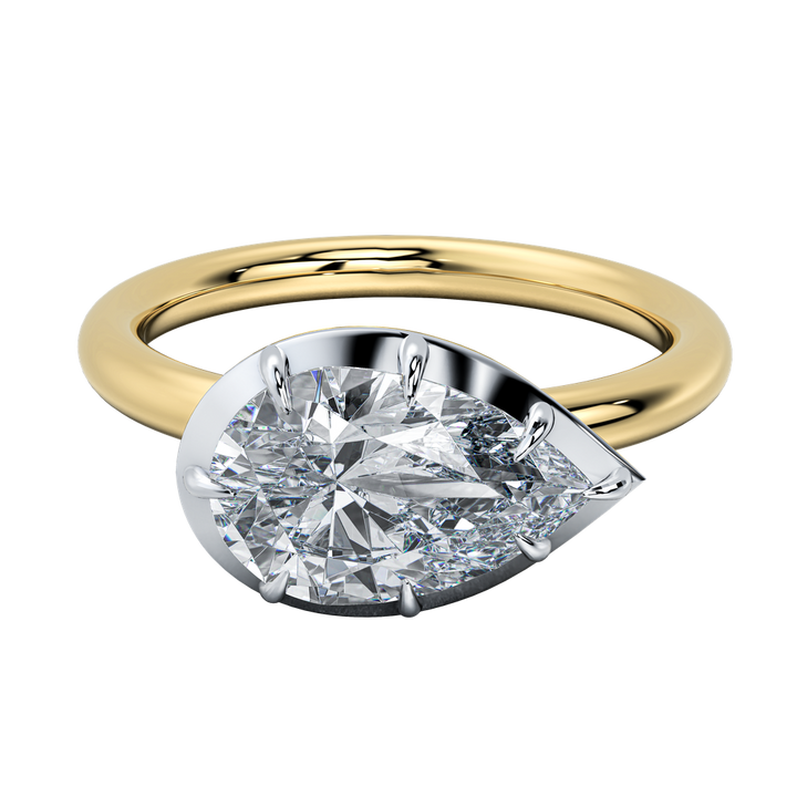 Taylor engagement ring: gold band with a pear-shaped diamond in a sleek bezel setting.
