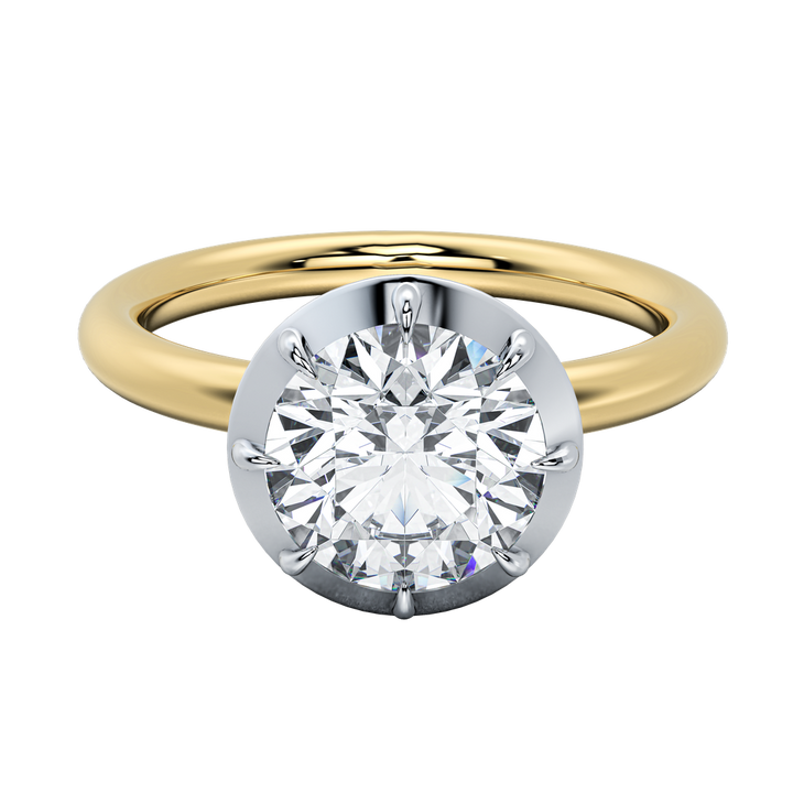 Taylor engagement ring: round diamond in a white gold bezel setting on a yellow gold band.