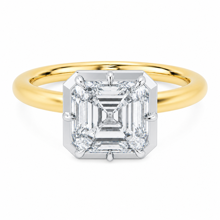 Taylor two-tone 14K yellow and white gold engagement ring with a 2 CT Asscher diamond and claw prongs.