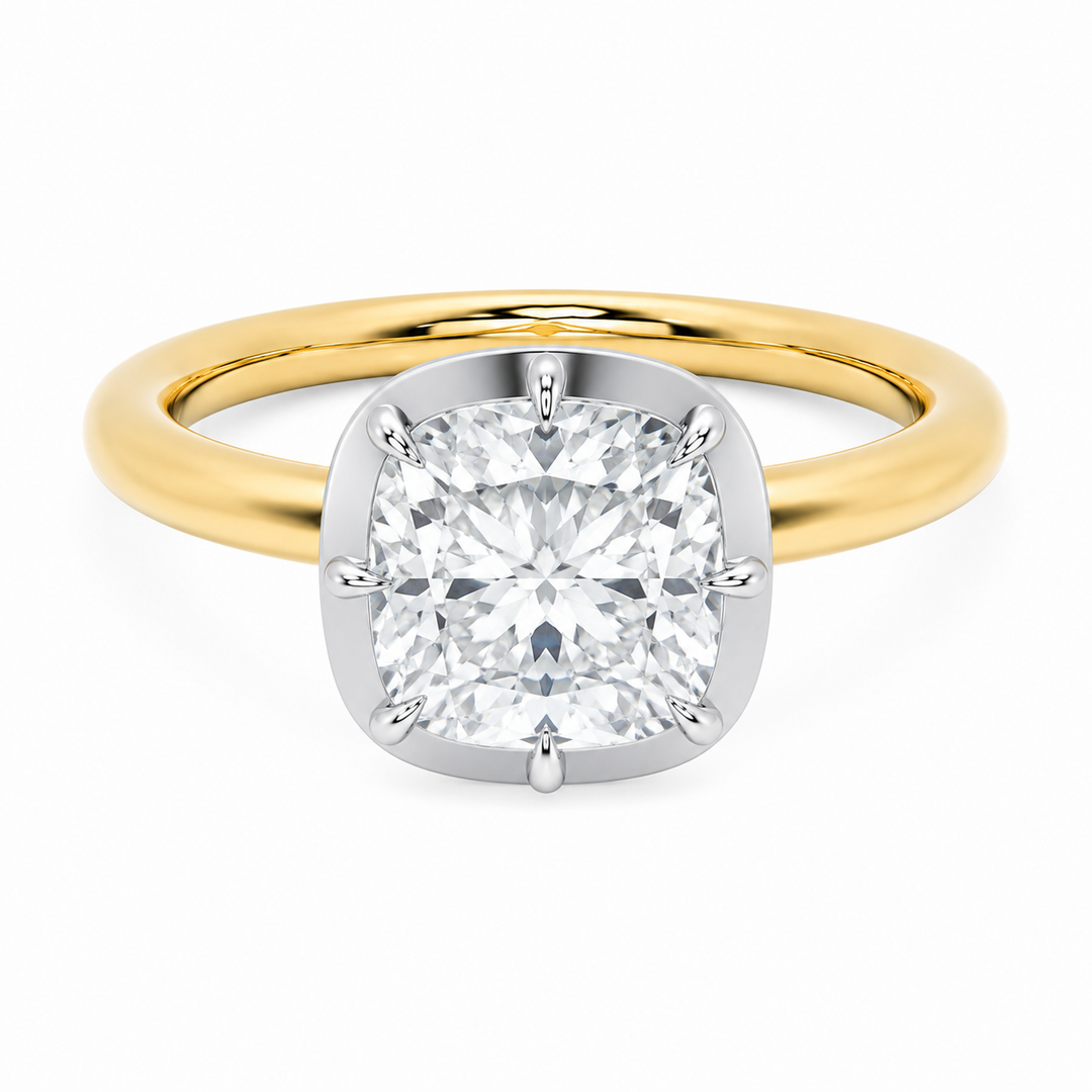 Taylor engagement ring with 2 CT cushion diamond, 14K yellow gold band, and white gold claw prongs.