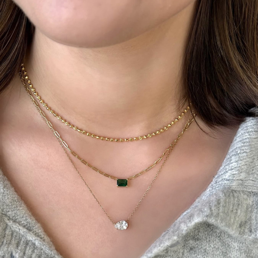 East-West Pear Solitaire Necklace On Model-Embark Fine Jewelry